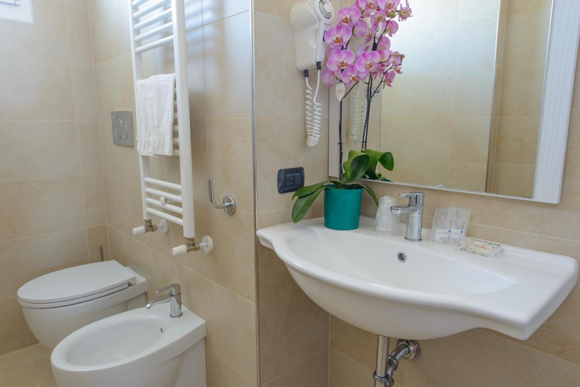 Hotel Sans Souci Rimini Bagian luar foto